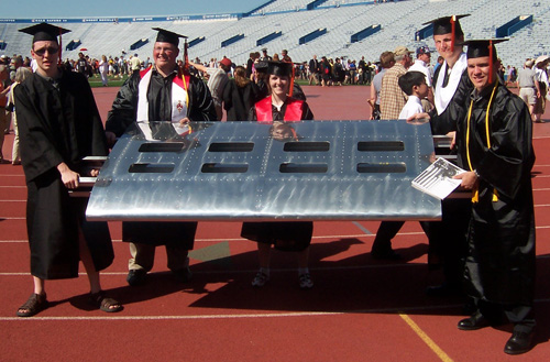 Stardust with an aircraft section she built with classmates